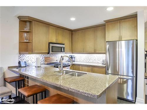 G103- A1-1869 Muskoka 118 Road W, Bracebridge, ON - Indoor Photo Showing Kitchen With Double Sink With Upgraded Kitchen