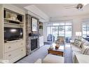 G103- A2-1869 Muskoka 118 Road W, Bracebridge, ON  - Indoor Photo Showing Living Room With Fireplace 