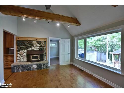 104 Knox Road E, Wasaga Beach, ON - Indoor Photo Showing Living Room With Fireplace