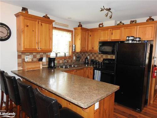 63 Madawaska Trail, Wasaga Beach, ON - Indoor Photo Showing Kitchen With Double Sink