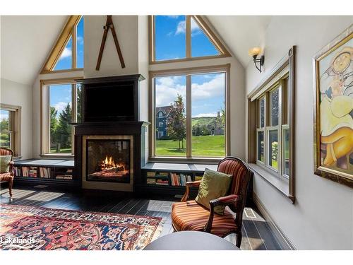 159 Snowbridge Way, The Blue Mountains, ON - Indoor Photo Showing Living Room With Fireplace