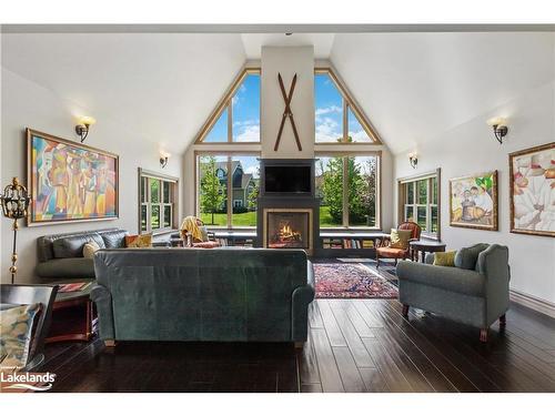 159 Snowbridge Way, The Blue Mountains, ON - Indoor Photo Showing Living Room With Fireplace