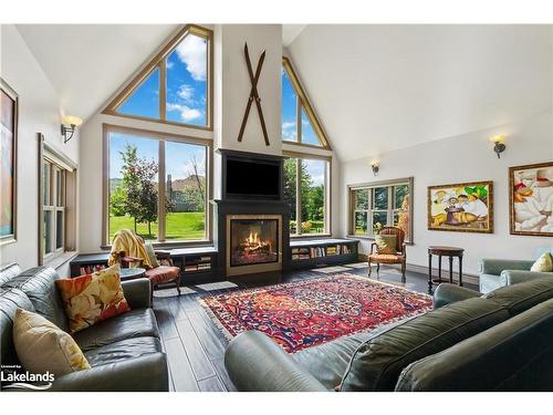 159 Snowbridge Way, The Blue Mountains, ON - Indoor Photo Showing Living Room With Fireplace