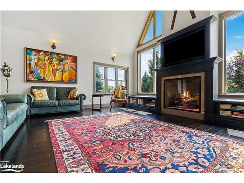 159 Snowbridge Way, The Blue Mountains, ON - Indoor Photo Showing Living Room With Fireplace