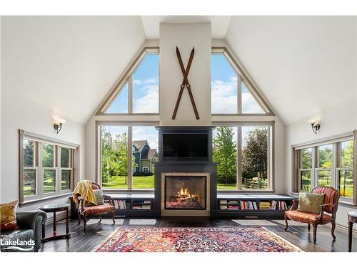 159 Snowbridge Way, The Blue Mountains, ON - Indoor Photo Showing Living Room With Fireplace