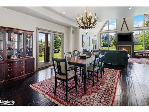 159 Snowbridge Way, The Blue Mountains, ON - Indoor Photo Showing Dining Room With Fireplace