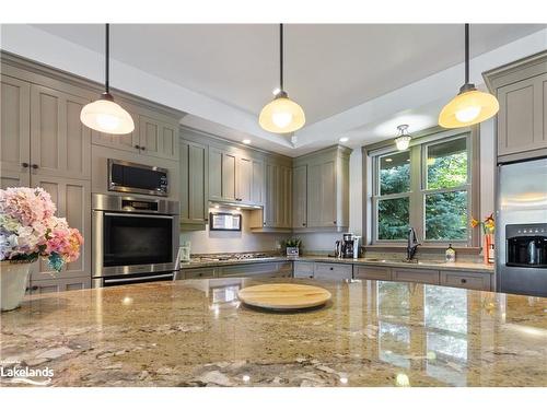 159 Snowbridge Way, The Blue Mountains, ON - Indoor Photo Showing Kitchen With Fireplace