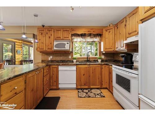 2 Sunset Trail, Whitestone, ON - Indoor Photo Showing Kitchen