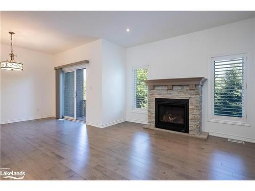 123 Conservation Way, Collingwood, ON - Indoor Photo Showing Living Room With Fireplace