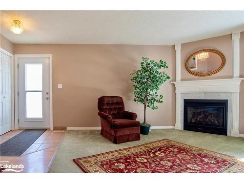 15 Pinecone Drive, Bracebridge, ON - Indoor Photo Showing Living Room With Fireplace