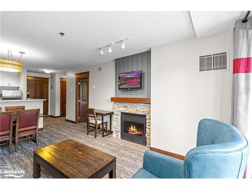 319/321-152 Jozo Weider Boulevard, The Blue Mountains, ON - Indoor Photo Showing Living Room With Fireplace