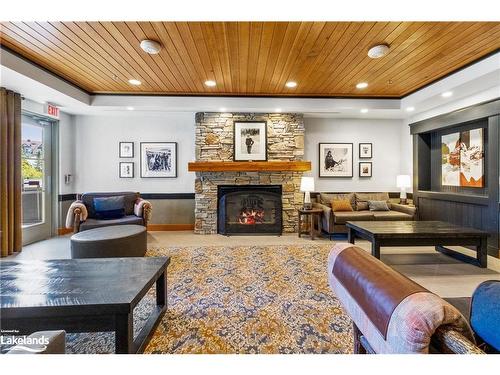 319/321-152 Jozo Weider Boulevard, The Blue Mountains, ON - Indoor Photo Showing Living Room With Fireplace