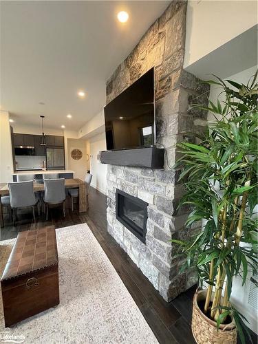 107-12 Beausoleil Lane, The Blue Mountains, ON - Indoor Photo Showing Living Room With Fireplace