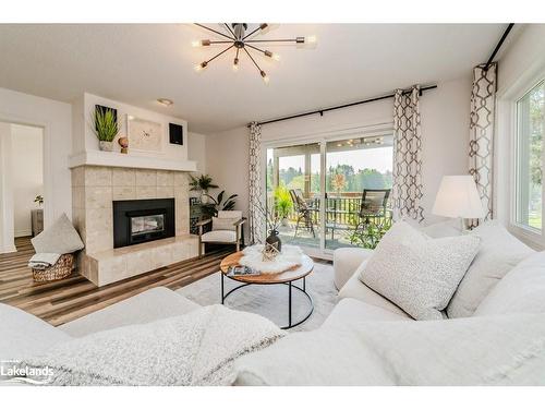 105-33 Deerhurst Greens Drive, Huntsville, ON - Indoor Photo Showing Living Room With Fireplace