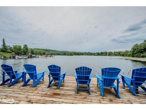 105-33 Deerhurst Greens Drive, Huntsville, ON - Outdoor With Body Of Water With Deck Patio Veranda With View