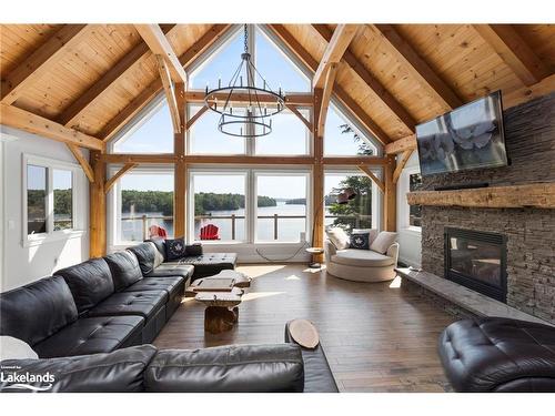 15 Gordon Point Lane, Seguin, ON - Indoor Photo Showing Living Room With Fireplace