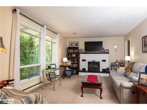 150 Lofty Pines Crescent, Gravenhurst, ON - Indoor Photo Showing Living Room With Fireplace