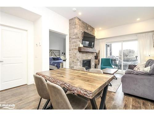 101-21 Beckwith Lane, The Blue Mountains, ON - Indoor Photo Showing Living Room With Fireplace