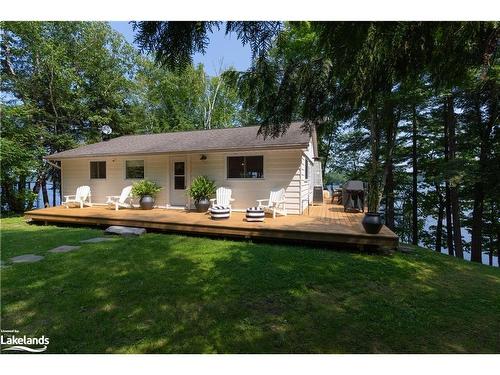 285 Mica Mine Road, Huntsville, ON - Outdoor With Deck Patio Veranda With Backyard