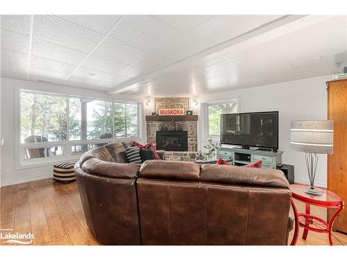 285 Mica Mine Road, Huntsville, ON - Indoor Photo Showing Living Room With Fireplace