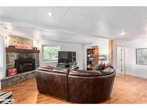 285 Mica Mine Road, Huntsville, ON - Indoor Photo Showing Living Room With Fireplace