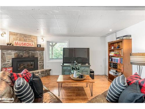 285 Mica Mine Road, Huntsville, ON - Indoor Photo Showing Living Room With Fireplace