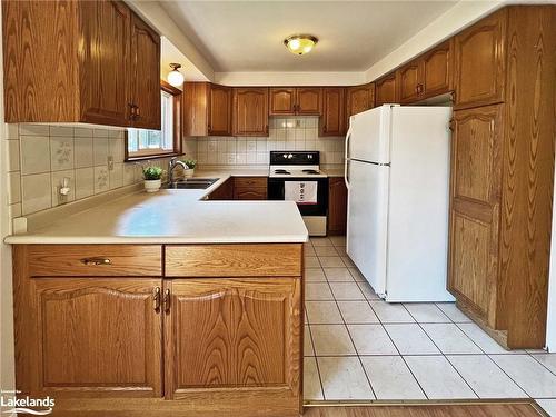 10 Pine Valley Drive, Carling, ON - Indoor Photo Showing Kitchen With Double Sink