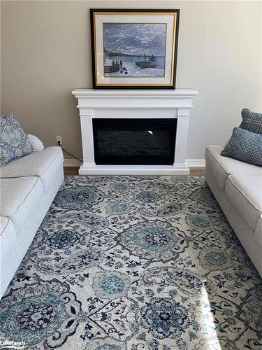 20 Connor Avenue, Collingwood, ON - Indoor Photo Showing Living Room With Fireplace