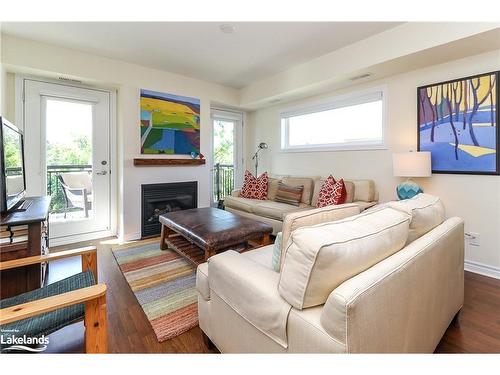 308-6 Brandy Lane Drive, Collingwood, ON - Indoor Photo Showing Living Room With Fireplace