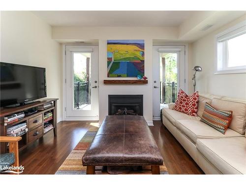 308-6 Brandy Lane Drive, Collingwood, ON - Indoor Photo Showing Living Room With Fireplace