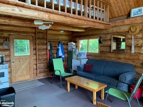 Na Kawawaymog Lake, South River, ON - Indoor Photo Showing Living Room