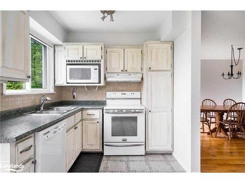 8 Glen Forest Trail, Tiny, ON - Indoor Photo Showing Kitchen With Double Sink