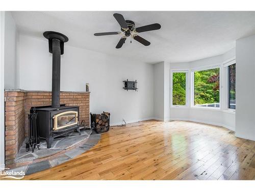 8 Glen Forest Trail, Tiny, ON - Indoor With Fireplace