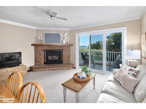 9-2 Ramblings Way, Collingwood, ON - Indoor Photo Showing Living Room With Fireplace