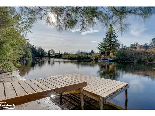 7-39 Southbank Drive, Bracebridge, ON - Outdoor With Body Of Water With Deck Patio Veranda With View