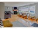 53 38Th Street, Wasaga Beach, ON  - Indoor Photo Showing Living Room With Fireplace 