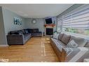 53 38Th Street, Wasaga Beach, ON  - Indoor Photo Showing Living Room With Fireplace 