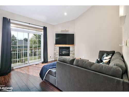 7-24 Albery Court, Meaford, ON - Indoor Photo Showing Living Room With Fireplace