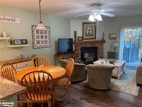 175-49 Trott Boulevard, Collingwood, ON - Indoor Photo Showing Dining Room With Fireplace