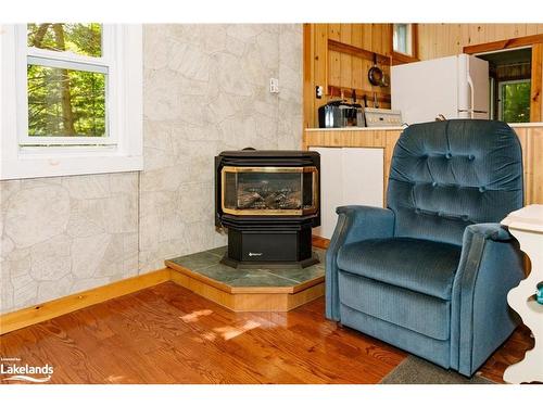 1017 Dungannon Drive, Minden Hills, ON - Indoor Photo Showing Living Room With Fireplace