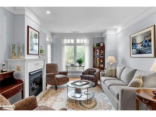 104-140 Cedar Island Road, Orillia, ON - Indoor Photo Showing Living Room With Fireplace