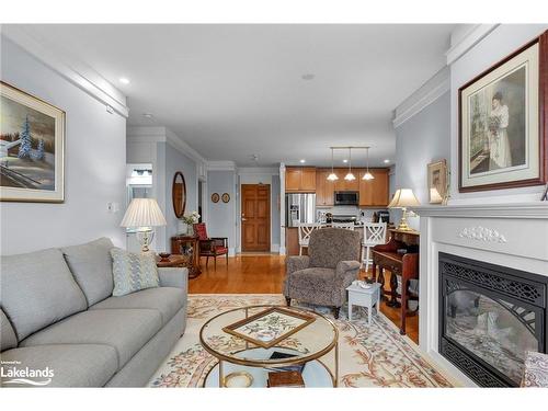 104-140 Cedar Island Road, Orillia, ON - Indoor Photo Showing Living Room With Fireplace