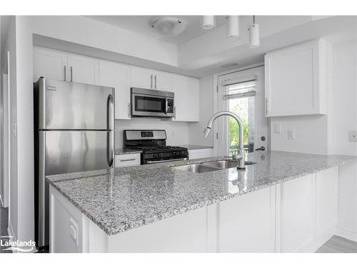 101-8 Brandy Lane Drive, Collingwood, ON - Indoor Photo Showing Kitchen With Double Sink With Upgraded Kitchen