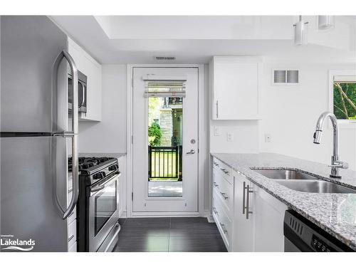 101-8 Brandy Lane Drive, Collingwood, ON - Indoor Photo Showing Kitchen With Double Sink With Upgraded Kitchen