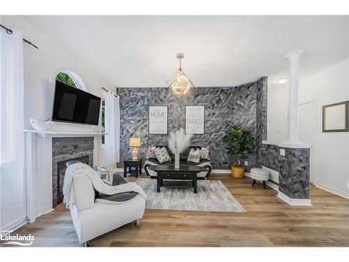 65 Oriole Crescent, Wasaga Beach, ON - Indoor Photo Showing Living Room With Fireplace