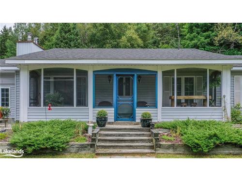 103 Old Centurian Road, Huntsville, ON - Outdoor With Deck Patio Veranda With Facade