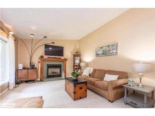 103 Old Centurian Road, Huntsville, ON - Indoor Photo Showing Living Room With Fireplace