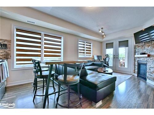 300-2 Anchorage Crescent, Collingwood, ON - Indoor Photo Showing Living Room With Fireplace