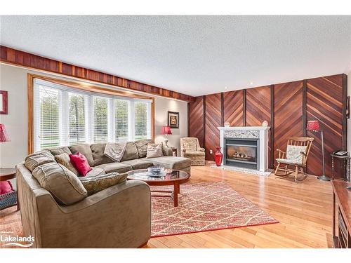 239 Oxbow Park Drive, Wasaga Beach, ON - Indoor Photo Showing Living Room With Fireplace