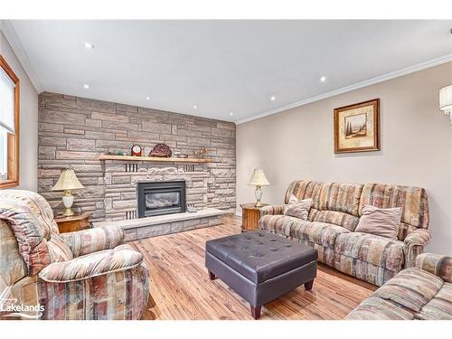 239 Oxbow Park Drive, Wasaga Beach, ON - Indoor Photo Showing Living Room With Fireplace